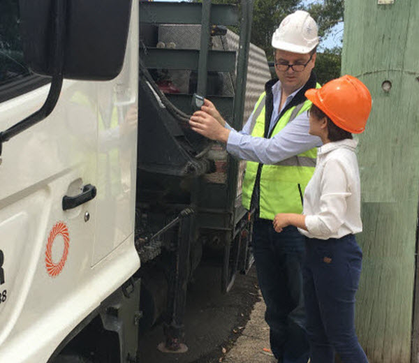 Two workers talking to each other